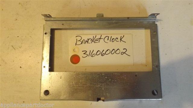 FRIGIDAIRE STOVE 316060002 Bracket-clock Mtg USED PART FRIGIDAIRE STOVE 316060002 Bracket-clock Mtg USED PART